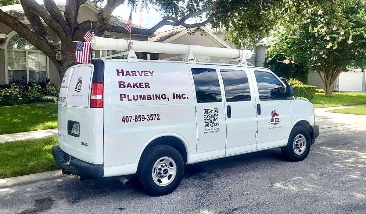 Harvey Baker Plumbing van outside of home in Orlando, FL